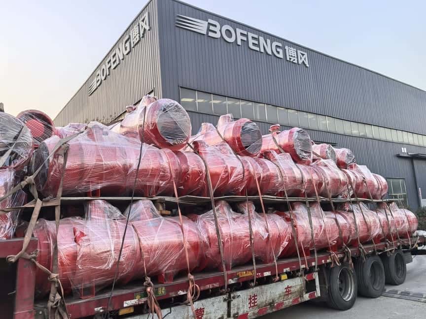 Mine ventilation fans wrapped and loaded on truck for shipment